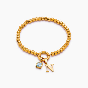 Bracelet Initiale Perlé à Pierre de Naissance