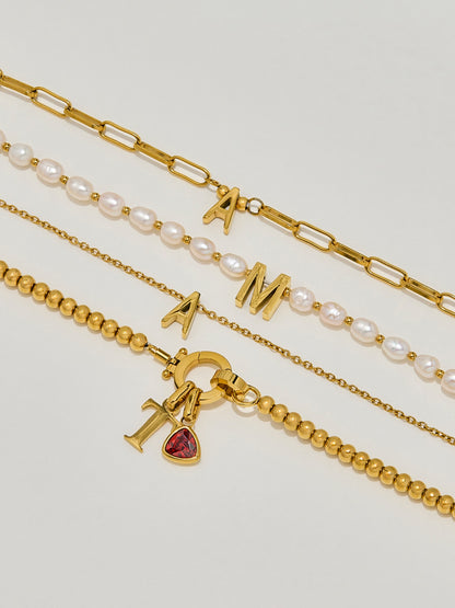 Bracelet Initiale Perlé à Pierre de Naissance